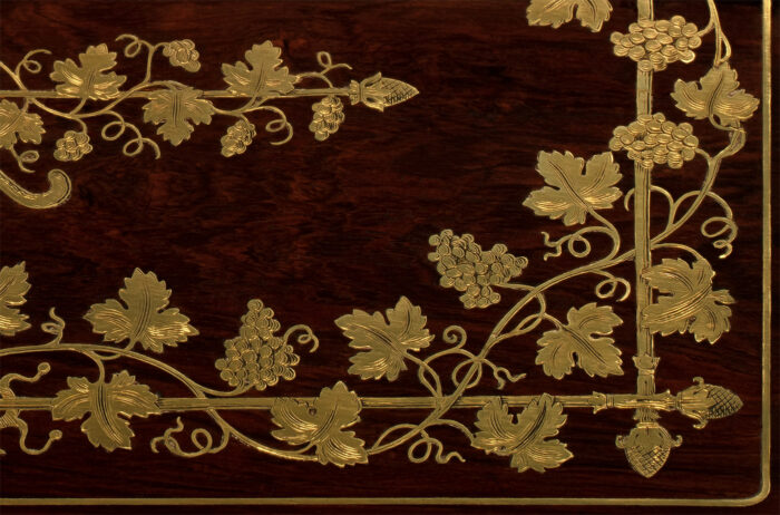 Brass inlay design depicting grapevines from a French antique jewellery box by Aucoc.